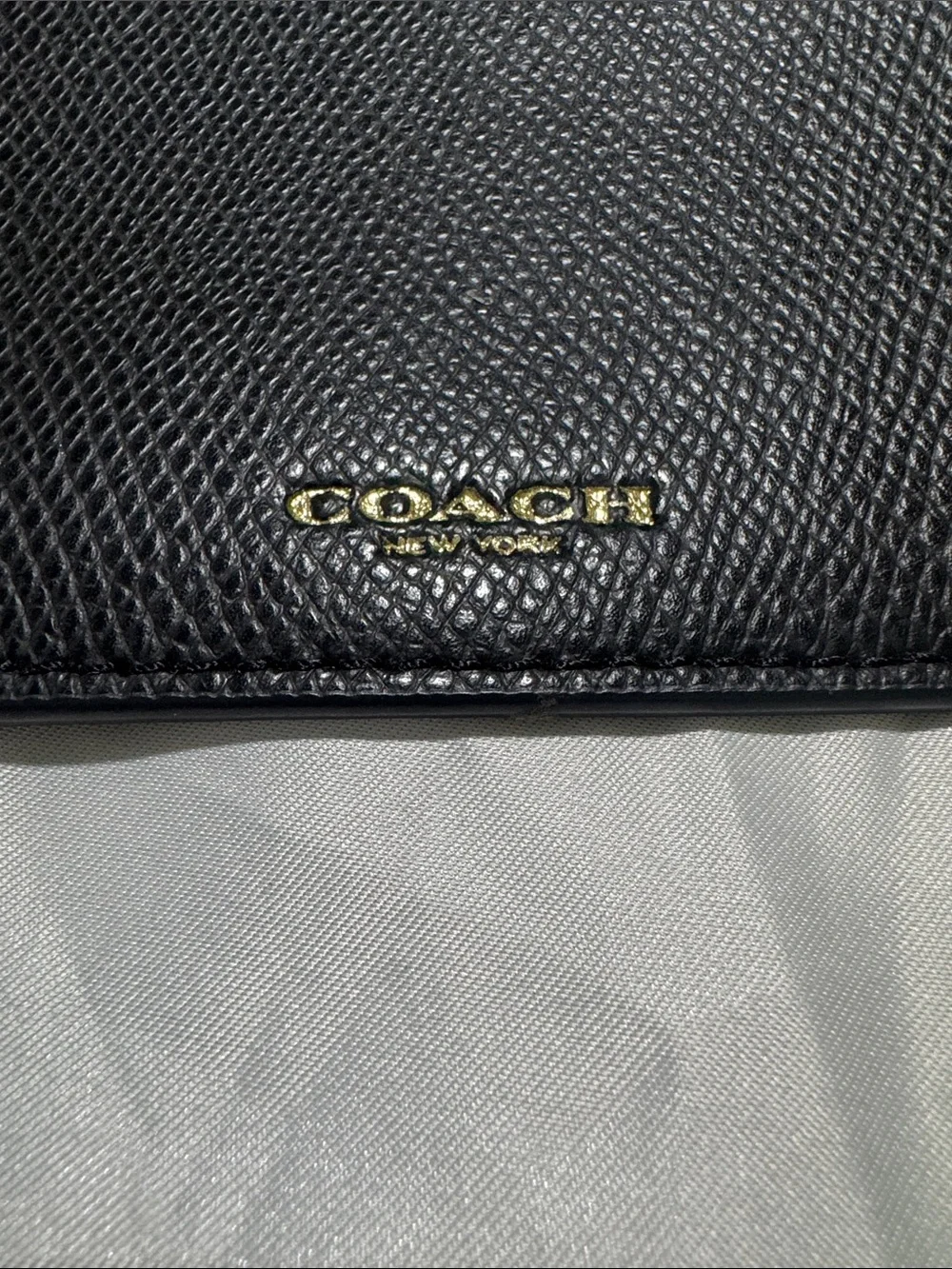Coach Black Pebble Leather Zip Pouch with Gold Logo